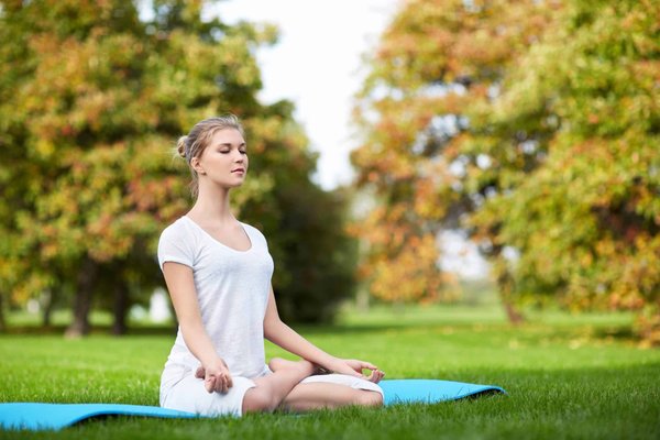 What Specific Yoga Asanas Aid in Alleviating Lower Back Pain?